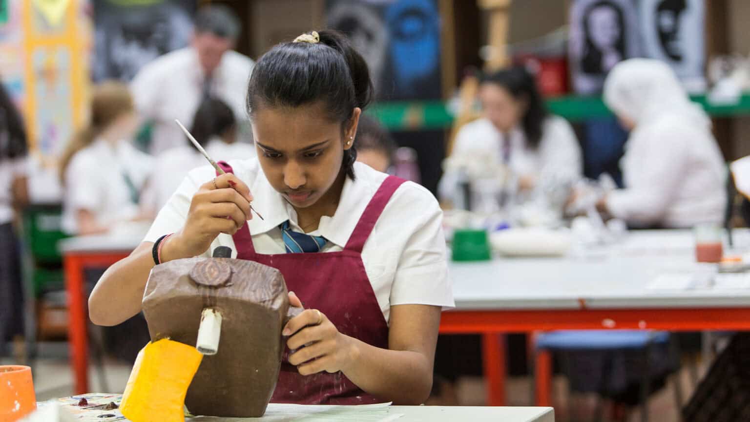 Creative student working on art project at World Schools international school.