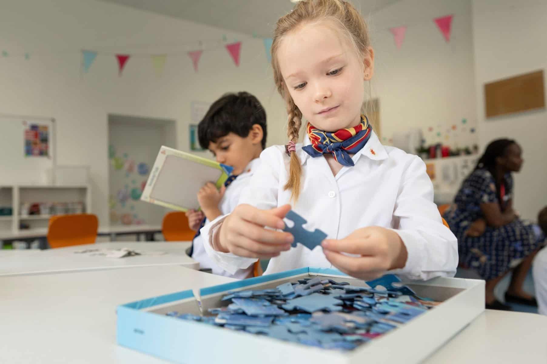 Children engaging in educational activities in a classroom setting.