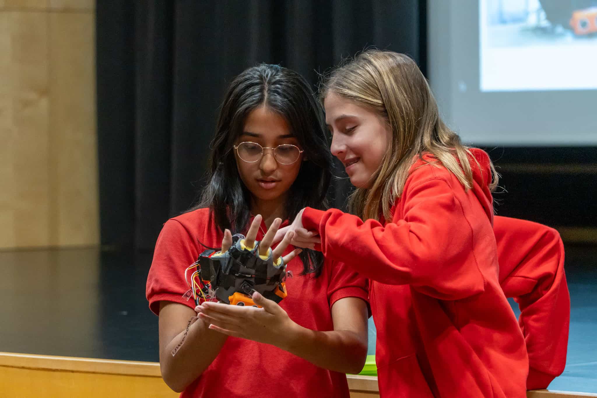 Robotics students collaborating at World Schools, focusing on innovation and STEM education.