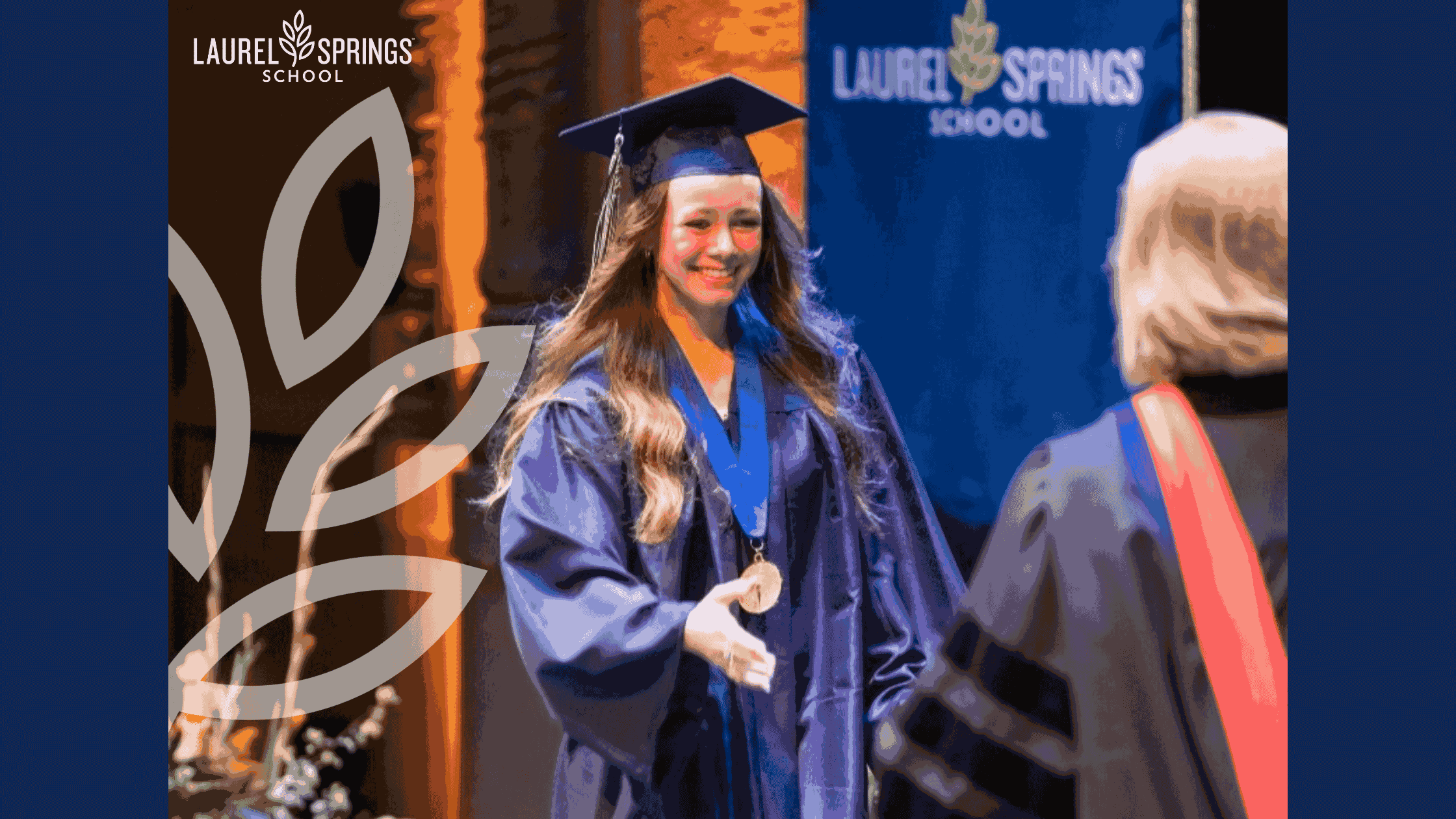 Happy graduate in cap and gown receiving diploma at Laurel Springs School event.
