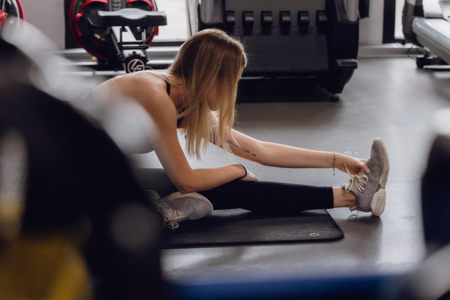 Stretching exercise for fitness at gym promoting health and wellness at world schools.