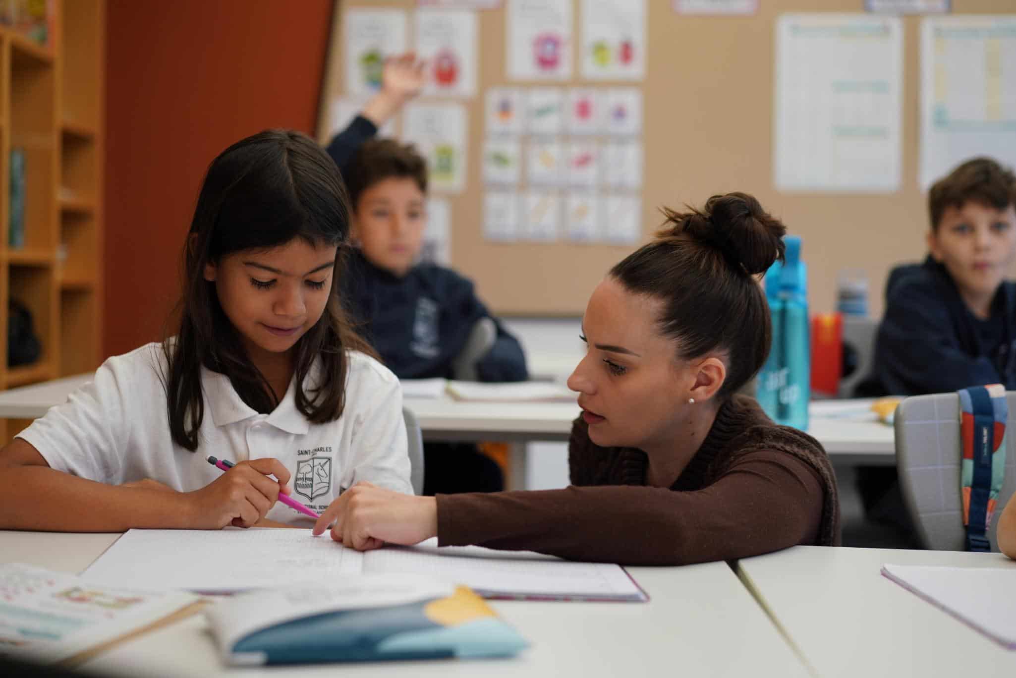 Engaging classroom at World Schools with attentive students learning actively.