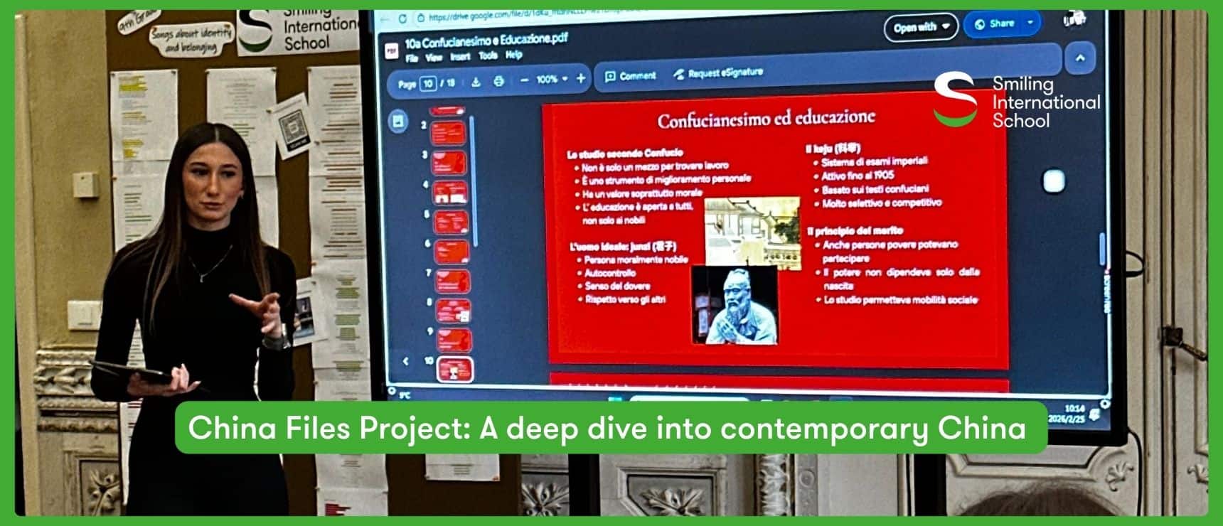 Student presenting Confucianism and education on digital screen at school.