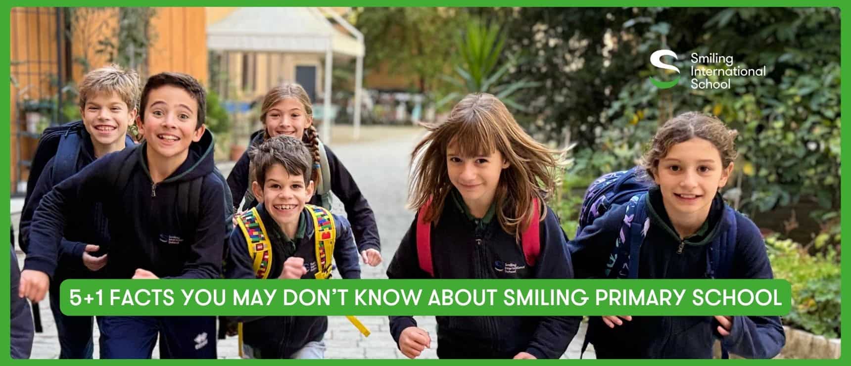 Group of happy primary school children walking outdoors with backpacks.